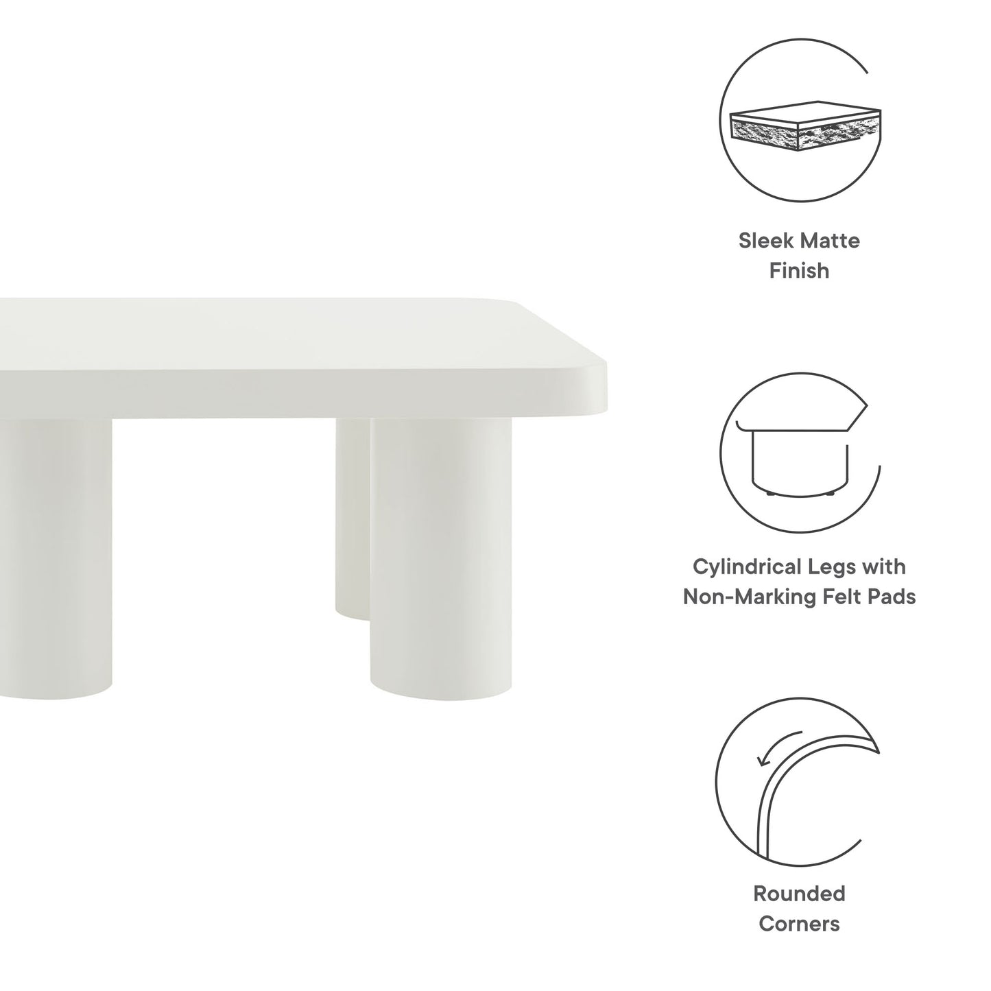 White rectangular coffee table with matte finish, cylindrical legs with felt pads, and rounded corners.