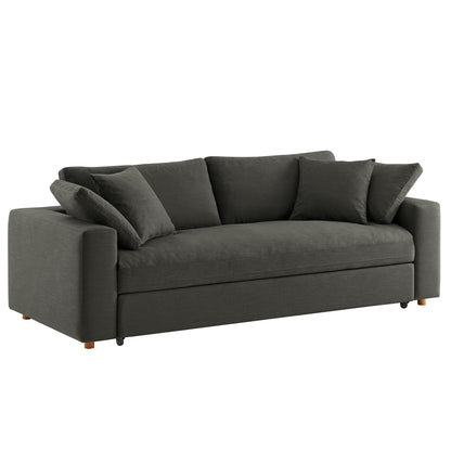 Dark gray fabric sofa with square arms, three-seat design, multiple back cushions and wooden legs.