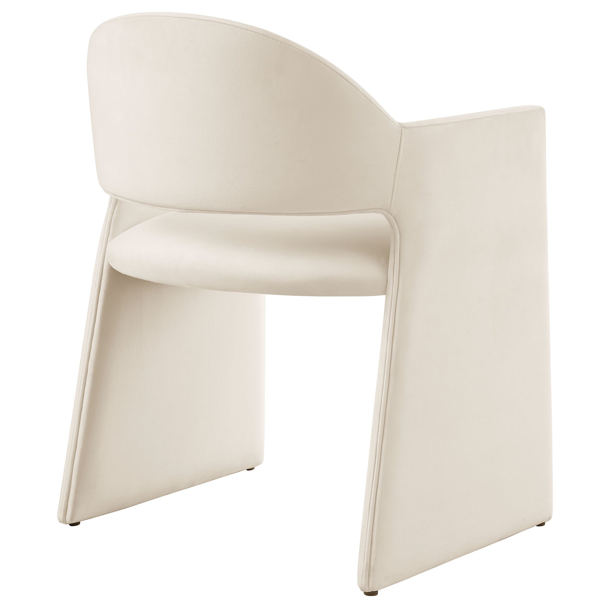 Brown velvet dining armchair with curved back, integrated arms, and sculptural wide base.