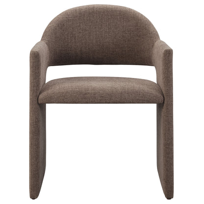 Brown upholstered fabric dining armchair with a rounded back and curved armrests.