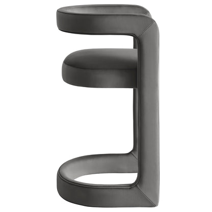 Gray velvet counter stool with a sculptural, E-shaped frame.