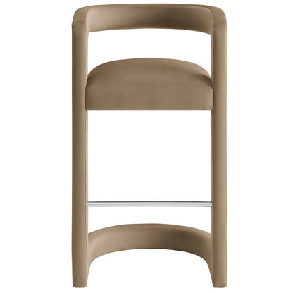 Taupe upholstered modern bar stool with padded seat, curved frame and chrome footrest.