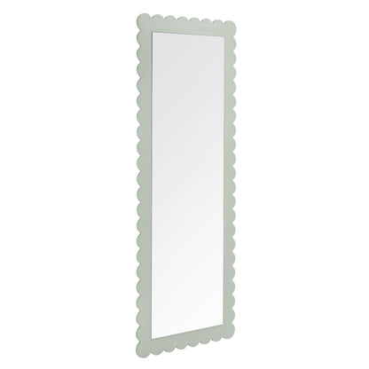 Tall vertical floor mirror with scalloped sage-green frame.