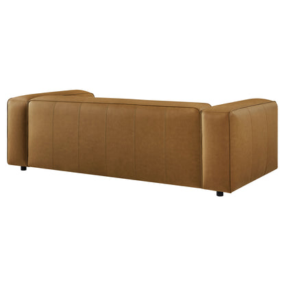 Brown vegan leather sofa with low profile, square arms, vertical stitched panels, and short black legs.