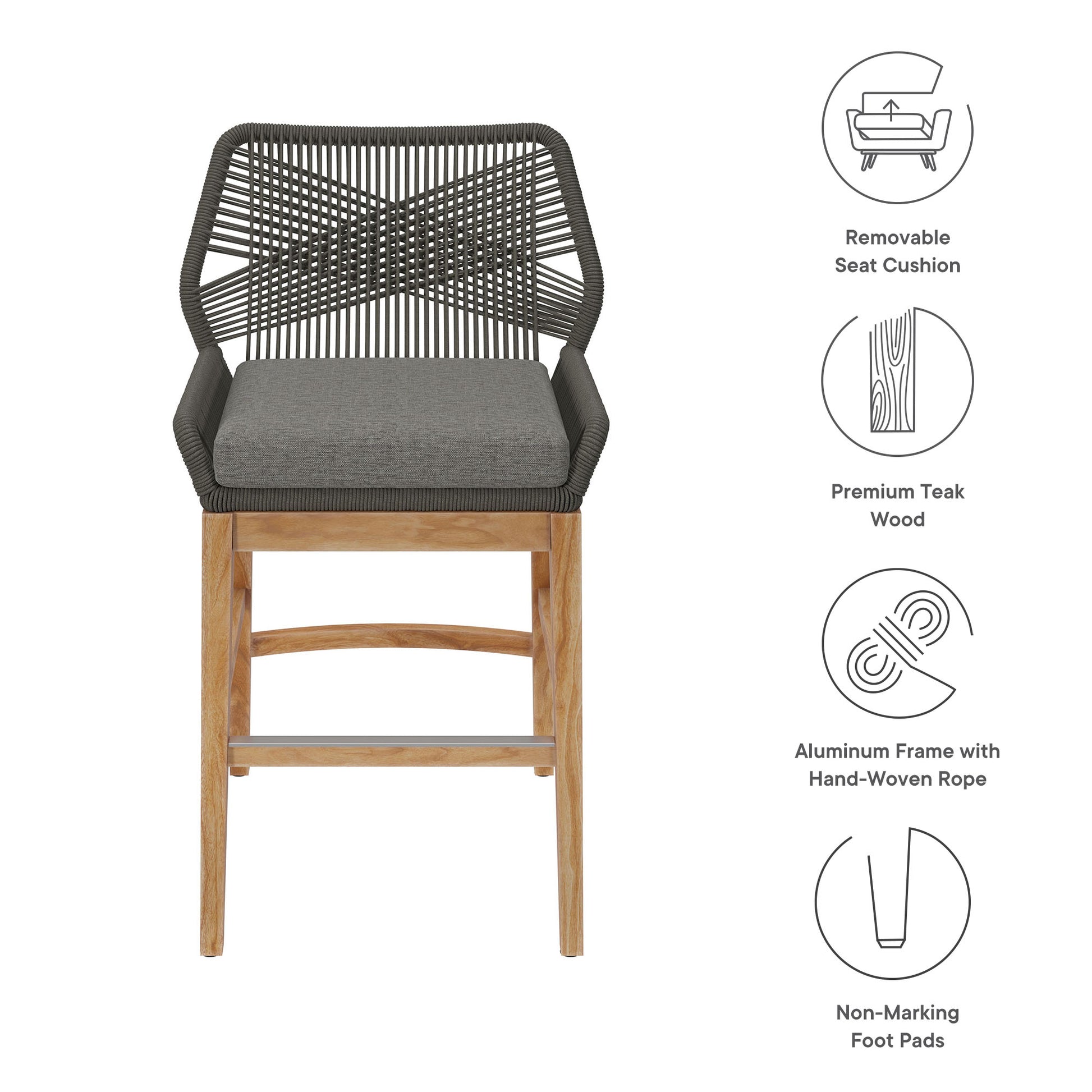 Bar-height outdoor counter stool with gray seat cushion, black hand-woven rope back, teak wood legs and aluminum frame.