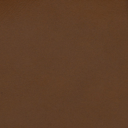 Close-up of brown vegan leather upholstery texture with fine grain & warm chestnut color.