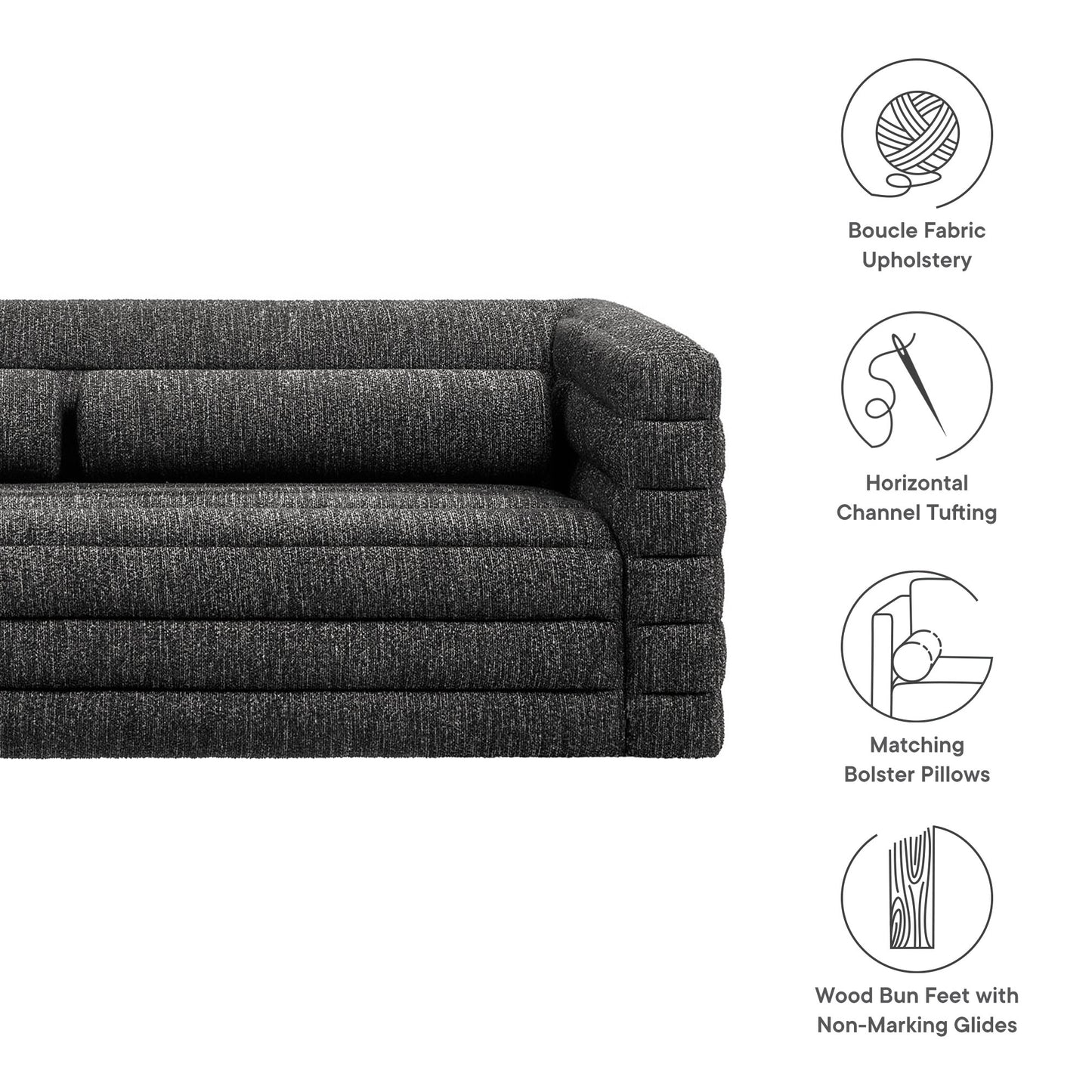 Charcoal boucle fabric upholstery sofa with horizontal channel tufting, matching bolster pillows, wood bun feet with non-marking glides.