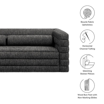 Charcoal boucle fabric upholstery sofa with horizontal channel tufting, matching bolster pillows, wood bun feet with non-marking glides.