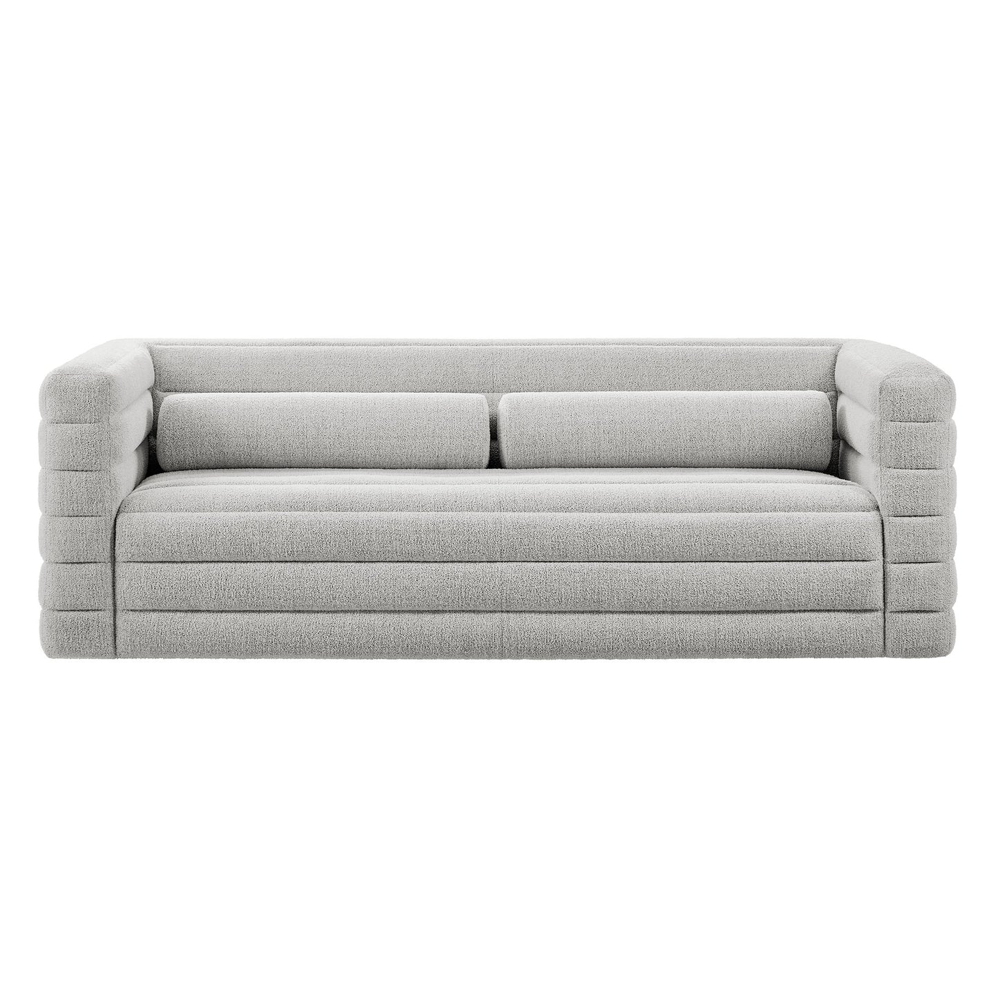 Light gray fabric sofa with chunky, segmented arms and long cushions, contemporary low-profile lounge seating.