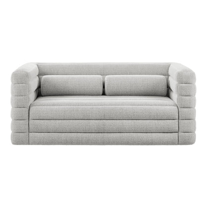 Light gray boucle upholstered loveseat with chunky ribbed tubular arms, two back cushions, channel tufting, modern contemporary style.
