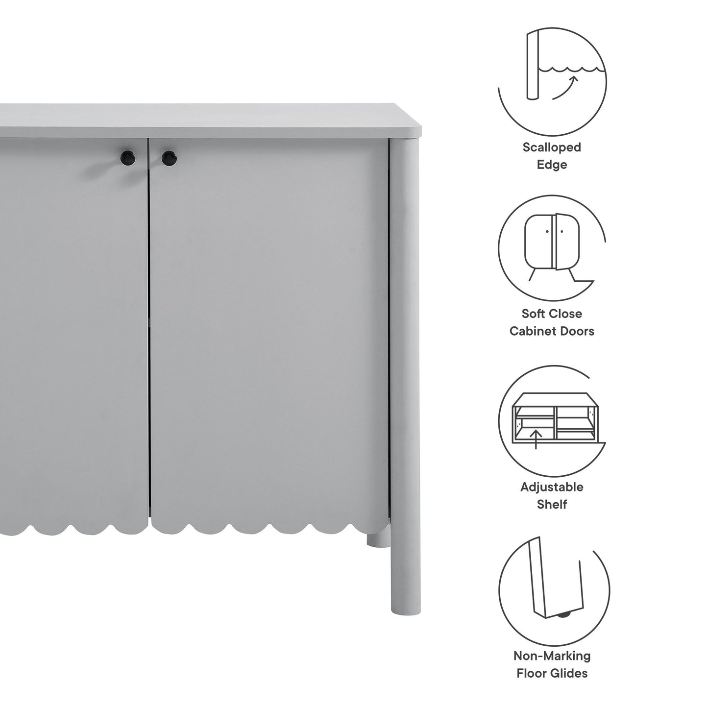 Light gray scalloped-edge sideboard cabinet with two doors, round knobs, soft-close doors and an adjustable shelf.