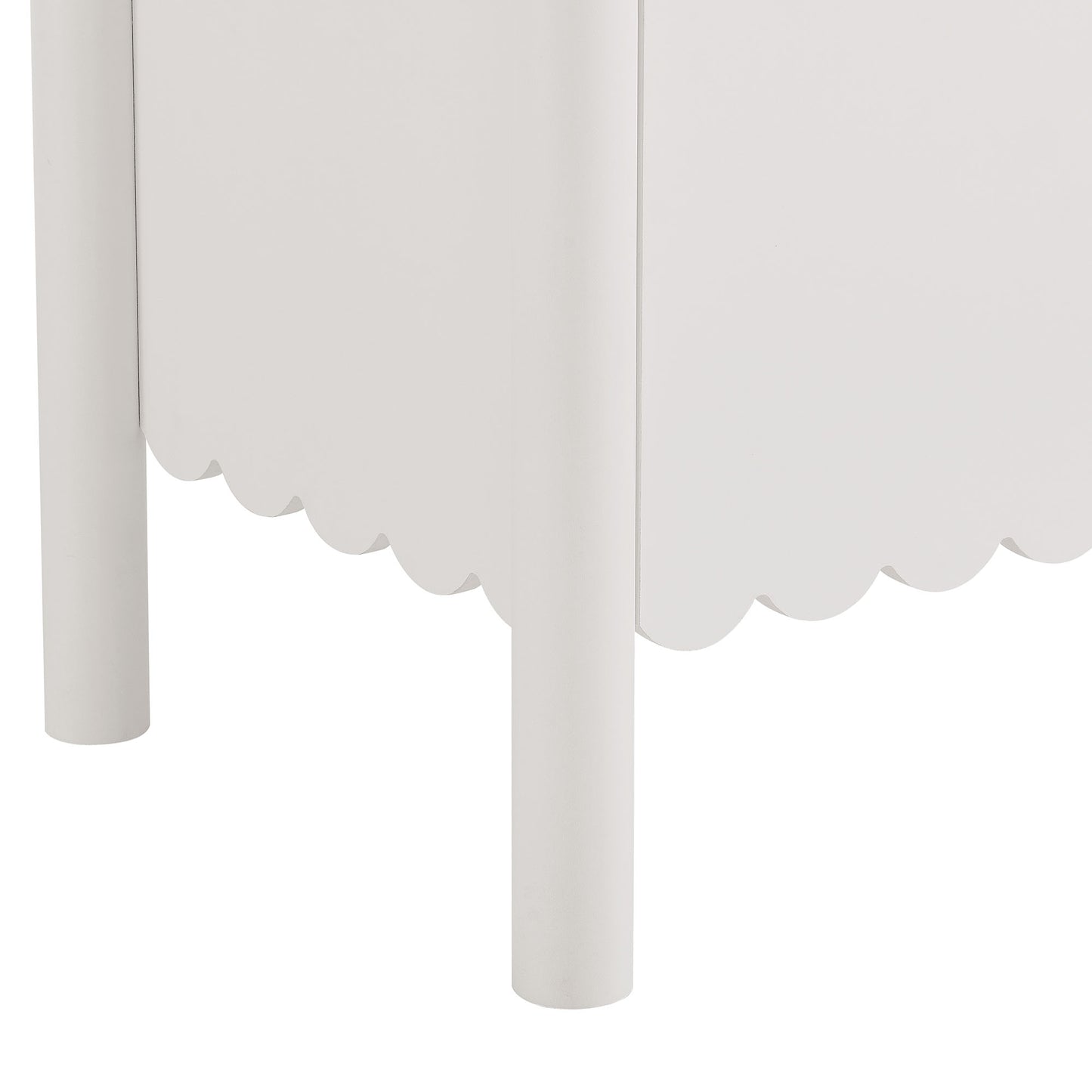 White wooden sideboard cabinet with cylindrical legs and scalloped bottom trim.