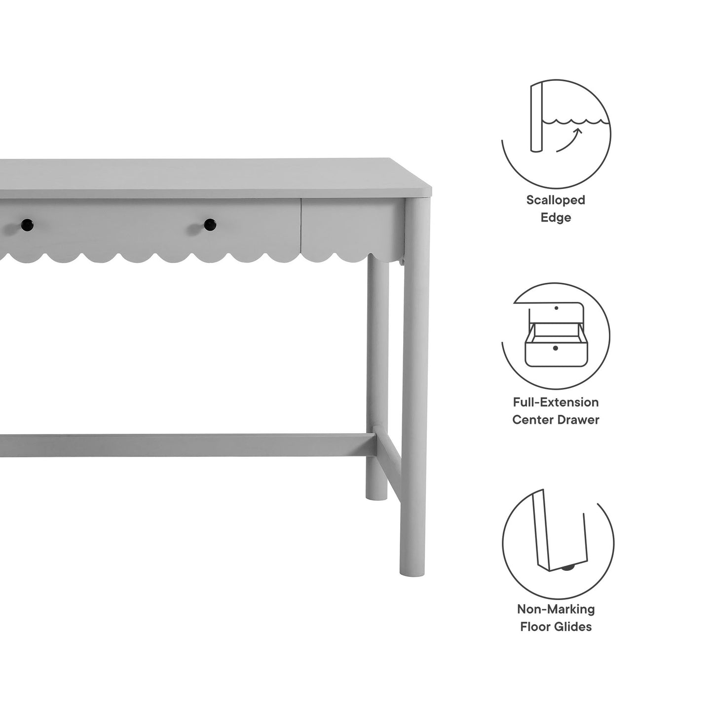 Light gray wooden desk with scalloped apron, full-extension center drawer, and non-marking floor glides.