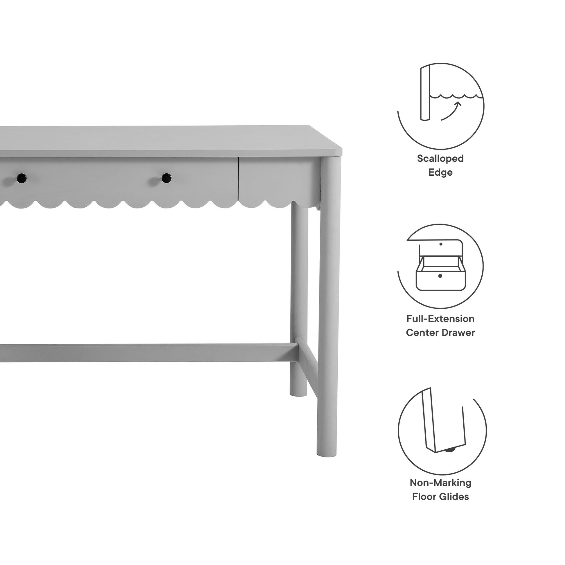 Light gray wooden desk with scalloped apron, full-extension center drawer, and non-marking floor glides.