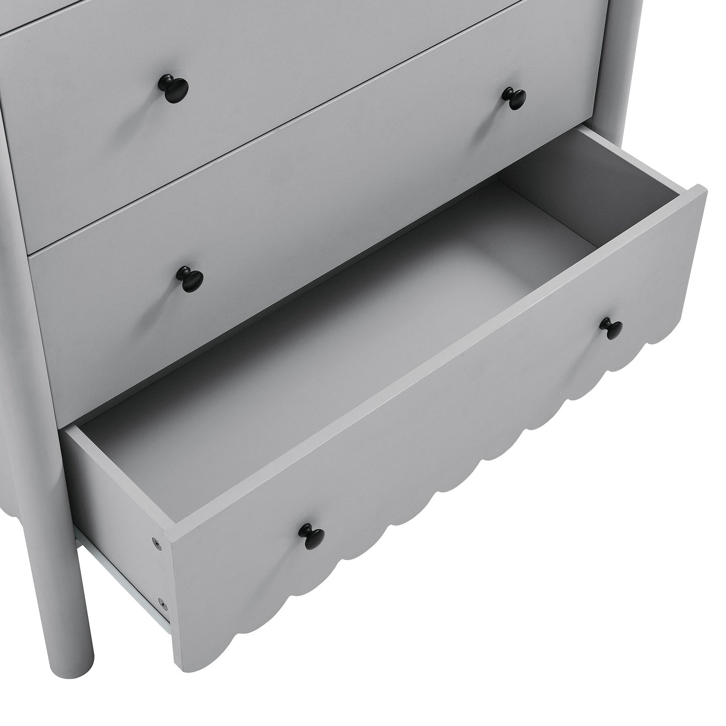 Light gray 5-drawer chest with black knobs; scalloped-front bottom drawer pulled open.