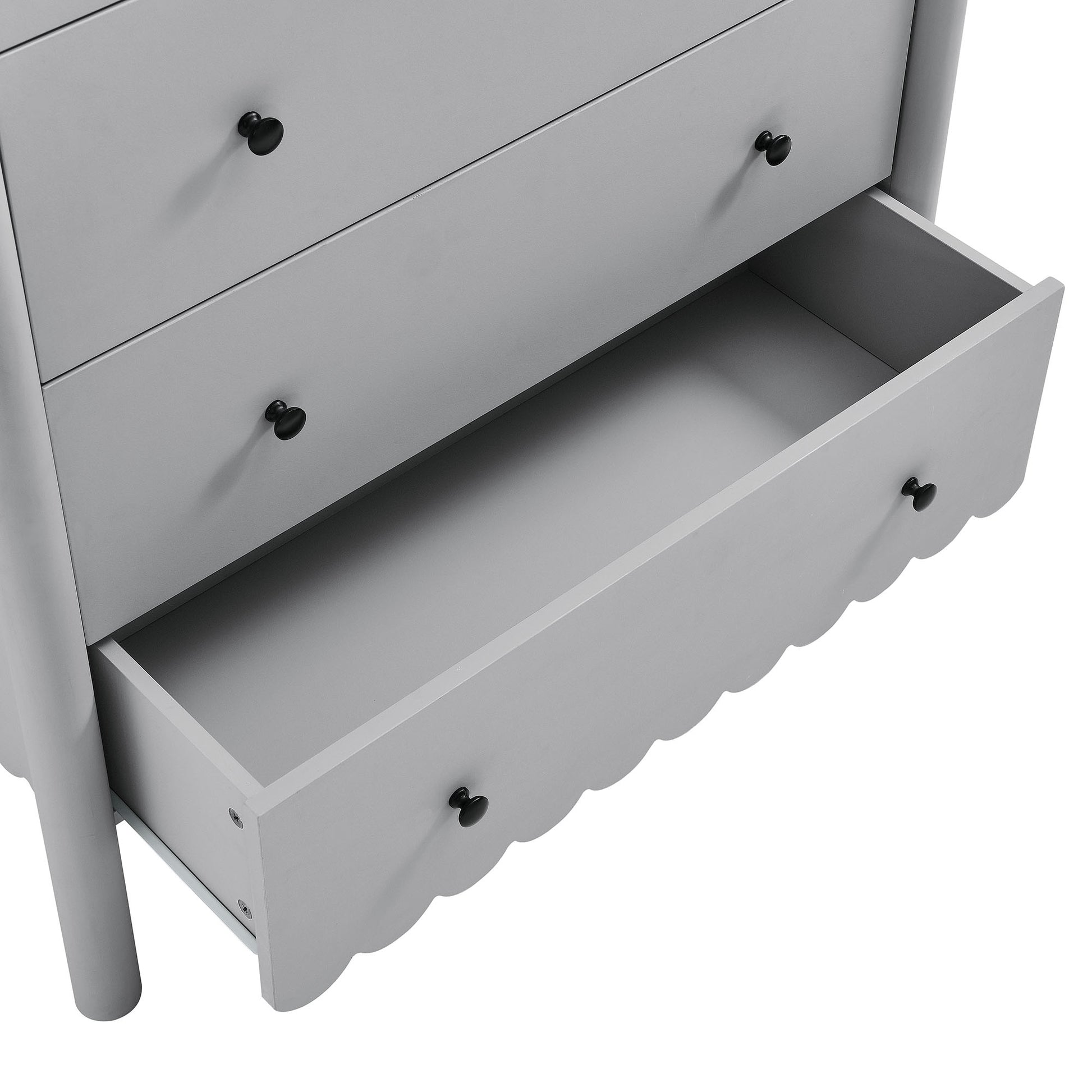 Light gray 5-drawer chest with black knobs; scalloped-front bottom drawer pulled open.
