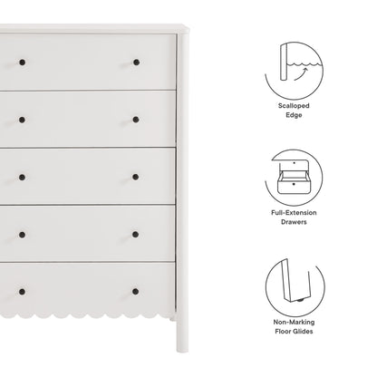 White wooden dresser with scalloped base, five drawers with black knobs, minimalist bedroom storage.