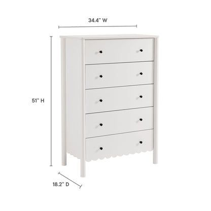 White wooden five-drawer dresser with round black knobs, scalloped bottom edge, tall bedroom storage.