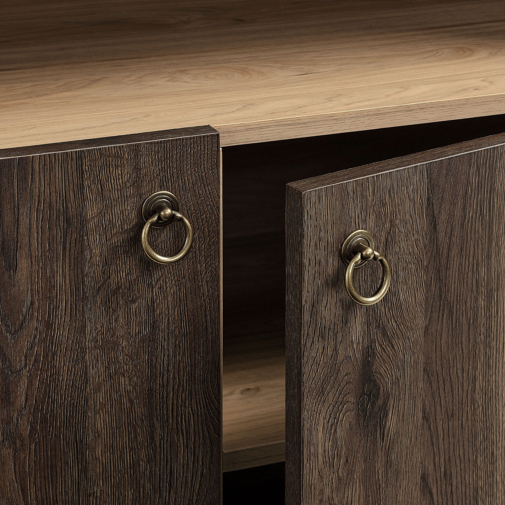 Dark walnut cabinet with two doors open, brass ring pulls, light wood top, visible inner shelf.