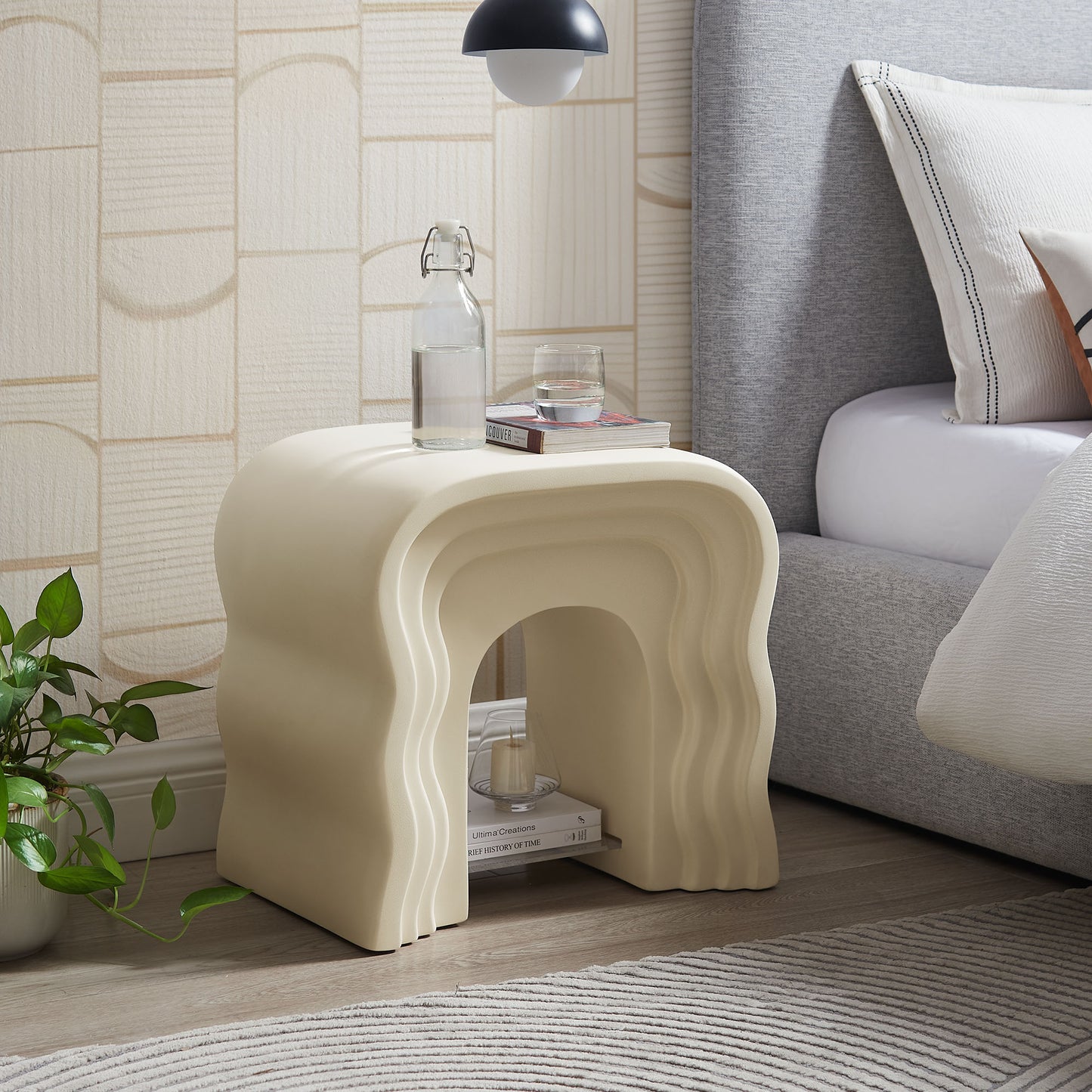 Ivory curved nesting side table with sculpted arches, modern resin; ideal as nightstand or living room accent.