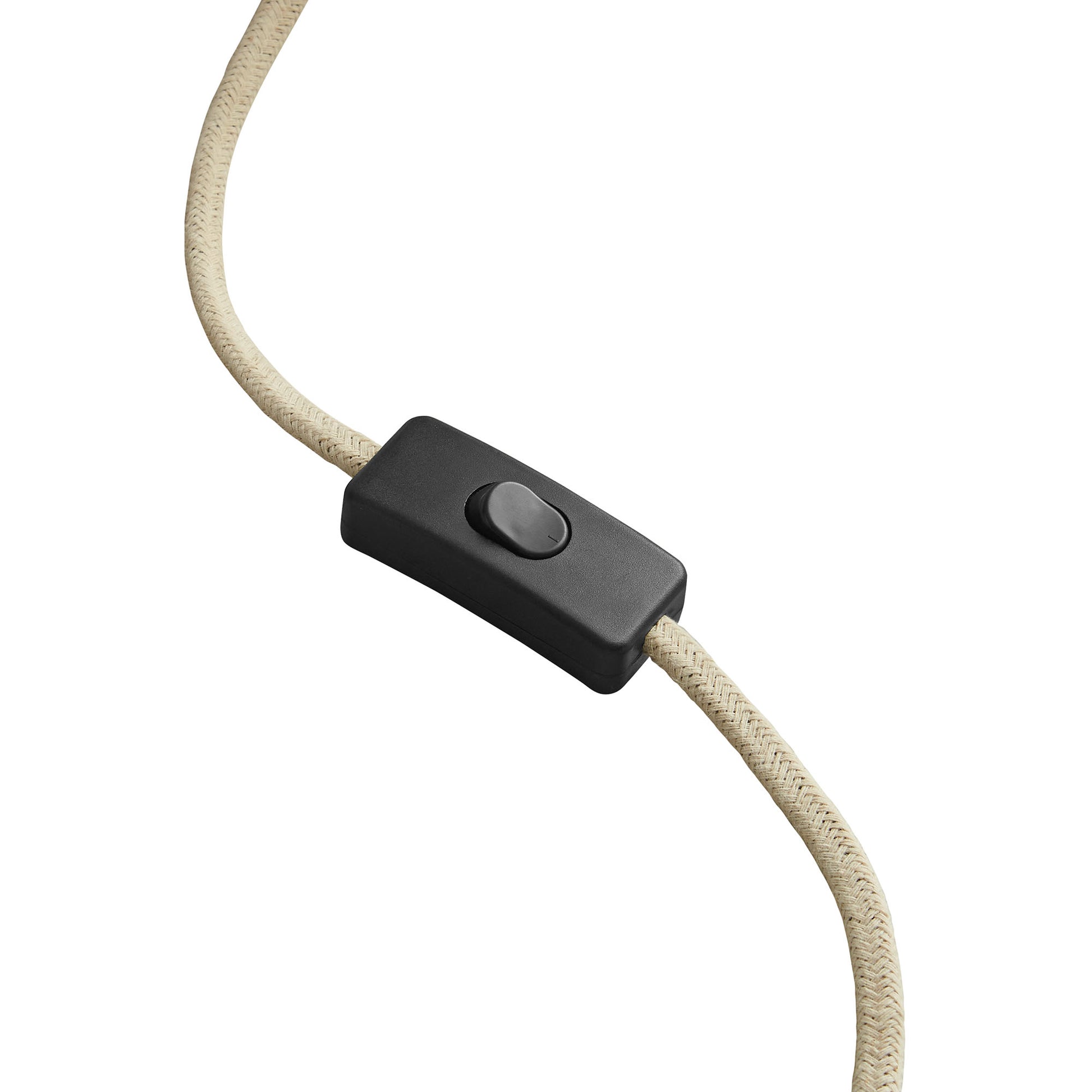 Beige braided fabric cord with a black inline switch for a table lamp with a dome shade.