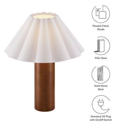 White pleated fabric shade atop a walnut wood pillar base lamp; mid-century modern table lamp with plug-in switch.