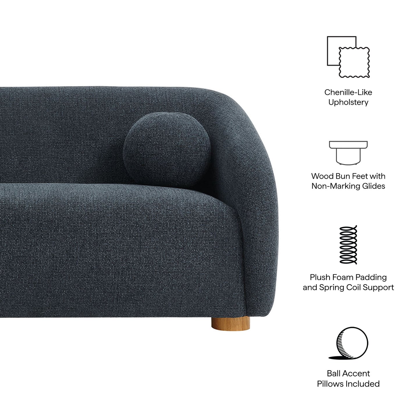 Navy chenille-like sofa with curved arm, wood bun feet, round bolster pillow, plush foam padding, ball accent pillows.