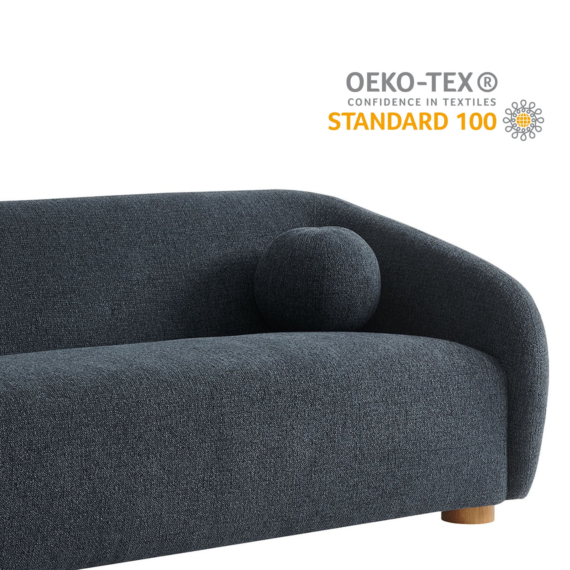 Dark navy woven fabric sofa with curved back, round bolster cushion, low wooden legs, modern living-room style.