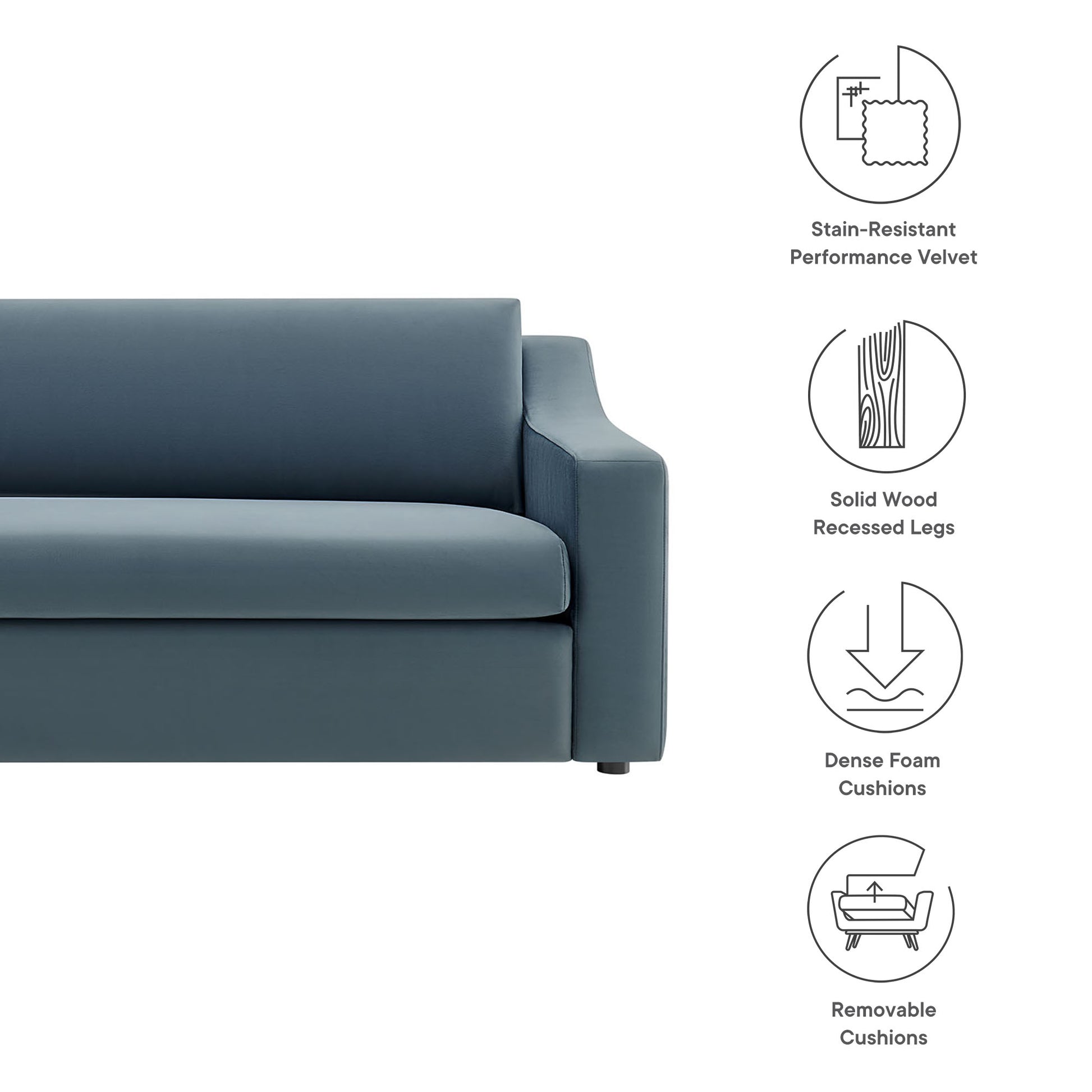 Blue velvet sofa with a sleek profile, recessed wooden legs, dense foam cushions, and removable cushions.