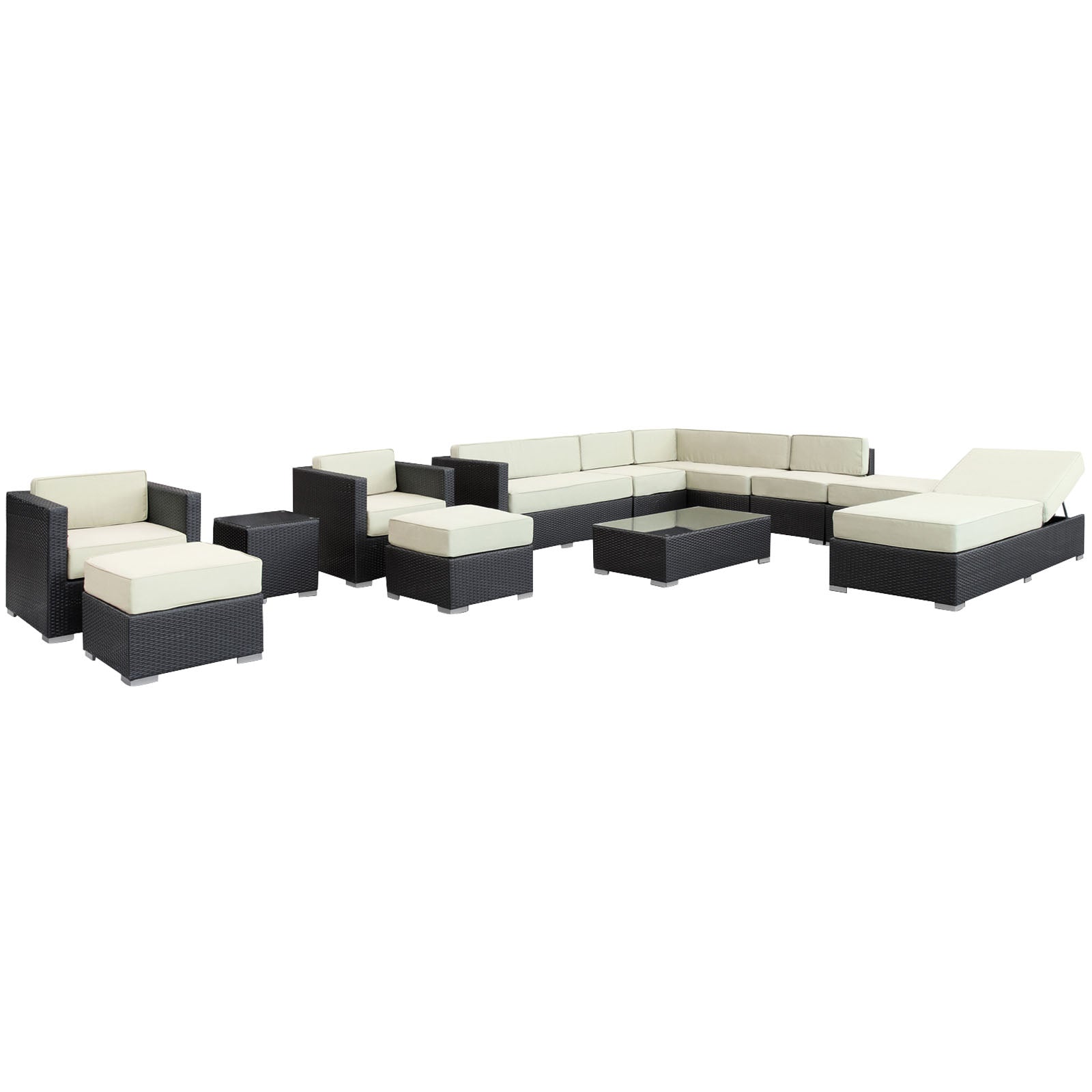 Outdoor dark wicker sectional with cream cushions; modular set includes sofa, chairs, ottomans and glass-top coffee table.