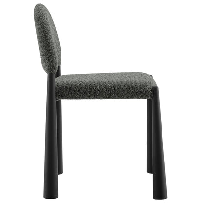 Modern dining chair with textured gray upholstery and black metal legs.