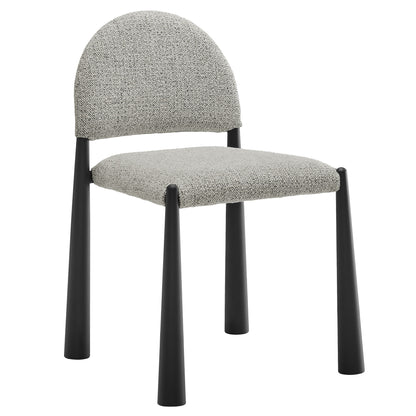 Grey fabric upholstered dining chair with rounded back and black tapered legs.