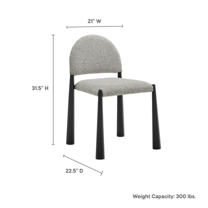 Grey fabric dining chair with rounded back and black tapered legs; 31.5"H x 21"W x 22.5"D.