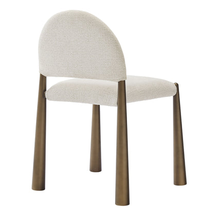 Cream woven fabric dining chair with rounded back, dark wood tapered legs, mid-century modern design.