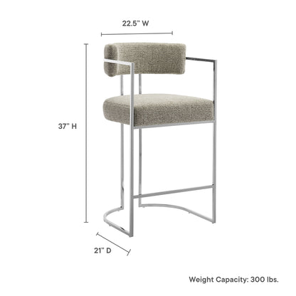 Chrome bar stool with light gray upholstered seat and back, slim frame, curved footrest, bar-height for counters.