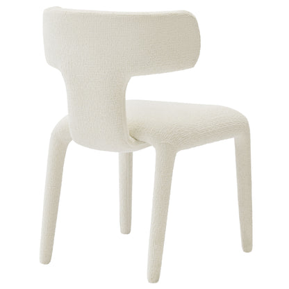 White boucle upholstered dining chairs with curved backs and four tapered legs; modern mid-century pair.
