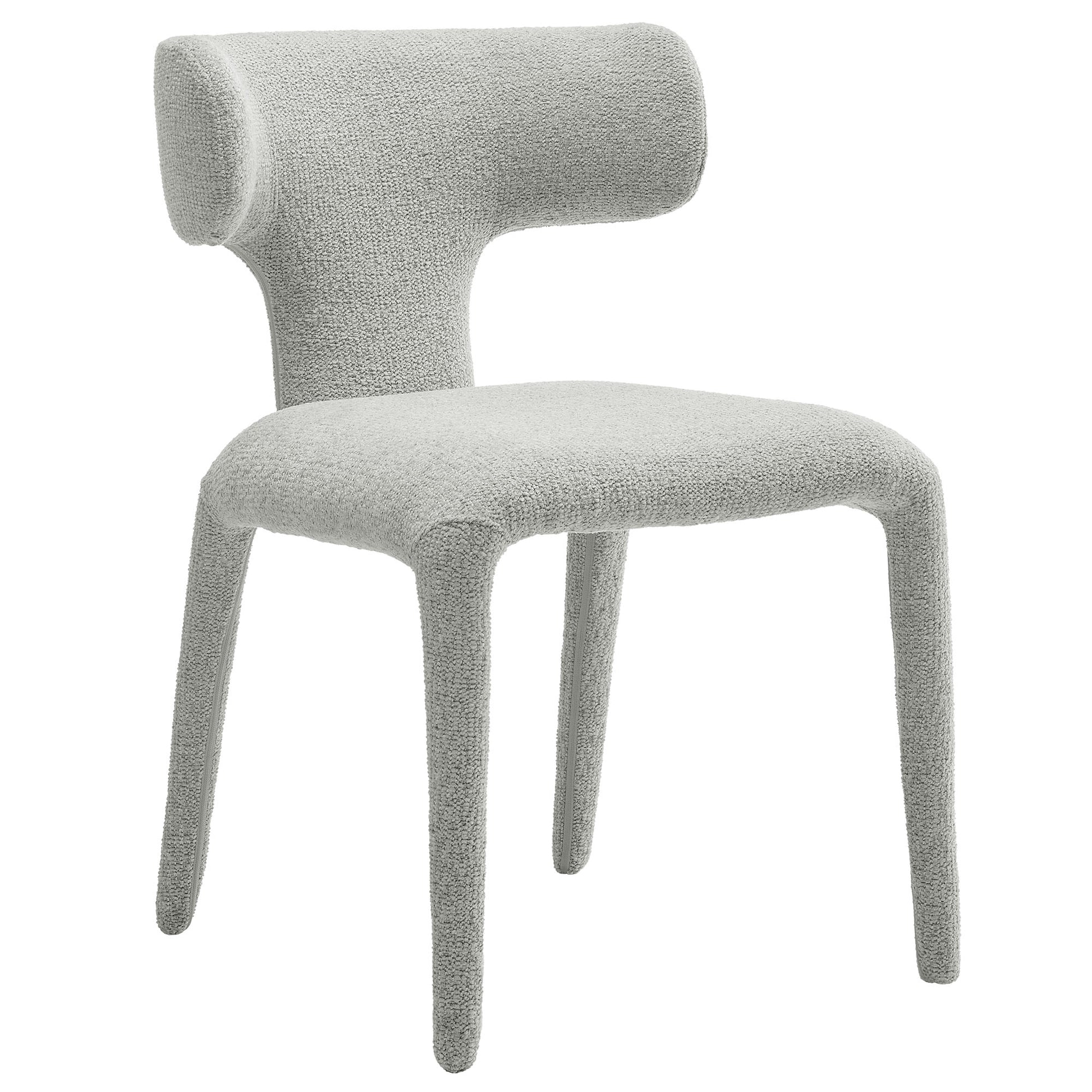 Light dove gray boucle upholstered dining chairs with curved backs and tapered legs.