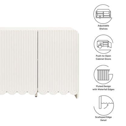White scalloped-edge sideboard storage cabinet with fluted radiator-style panels, push-to-open doors and adjustable shelves.