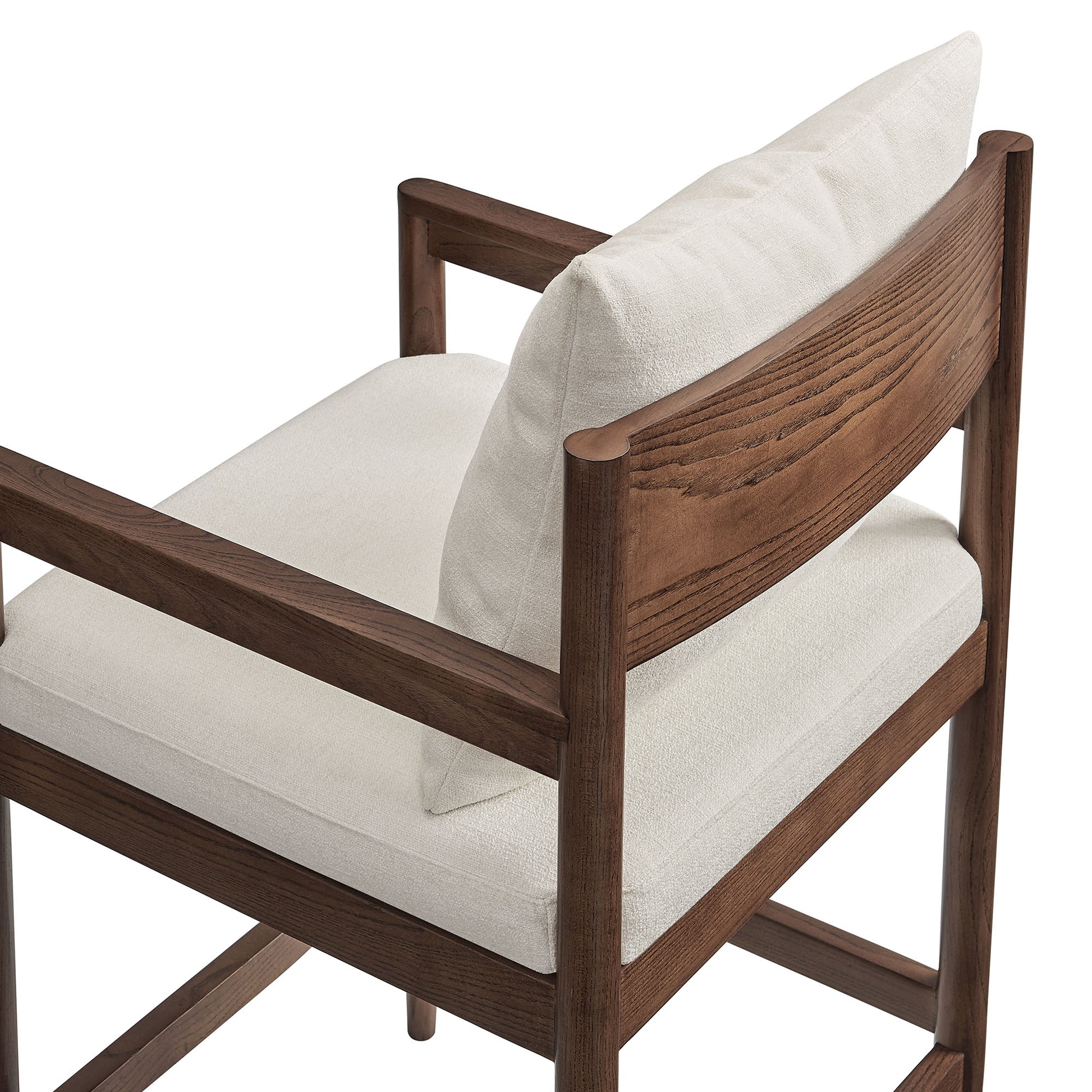 White wood counter stool with upholstered seat and back cushion, mid-century modern style.