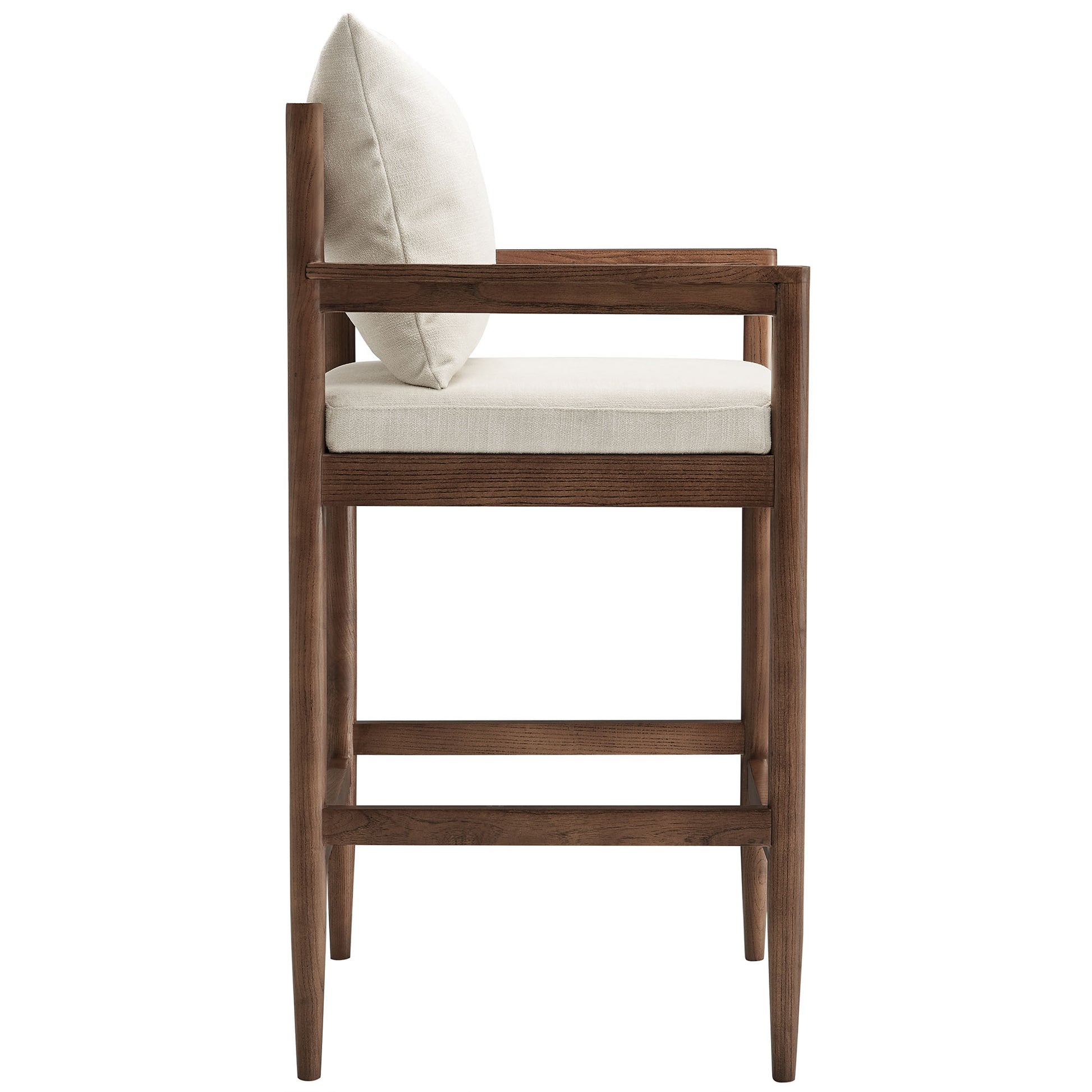White wood bar stool with beige upholstered seat and back cushion, mid-century modern, tapered legs.