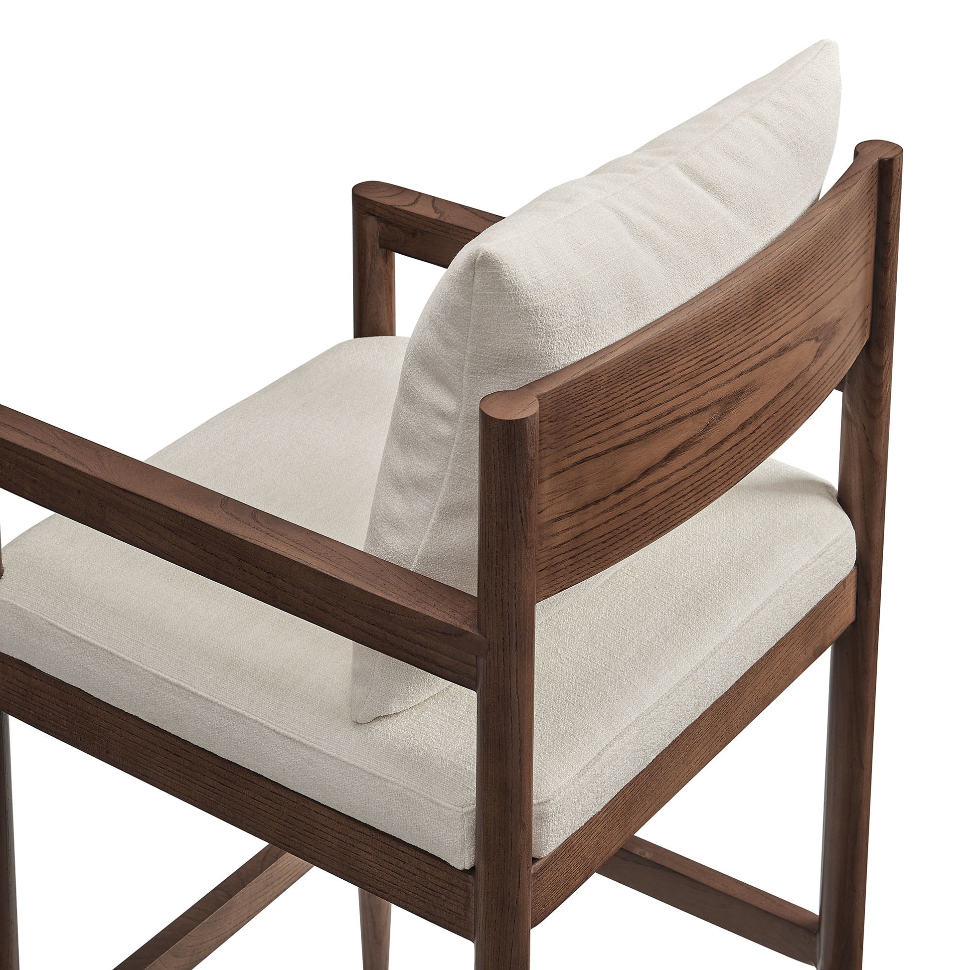 Mid-century wooden bar stool in dark walnut finish with cream fabric cushions.