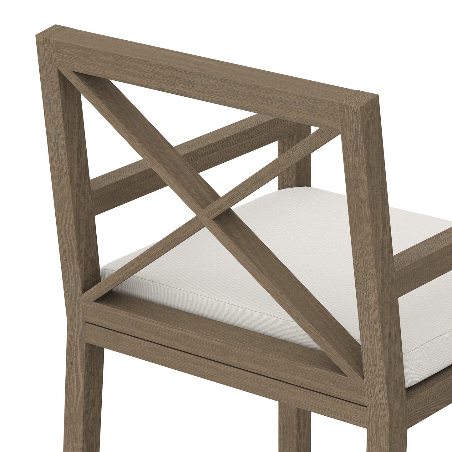 Teak outdoor dining armchair with an X-back design and a white seat cushion.
