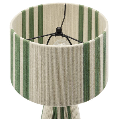 Table lamp with beige fabric shade featuring vertical green stripes, drum shape, spider fitter with interior bulb socket.