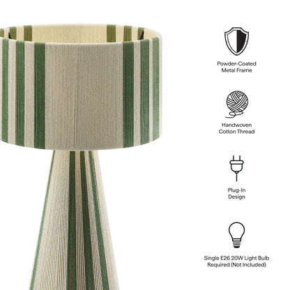 Beige and green striped fabric drum shade atop a matching tapered base; plug-in table lamp.