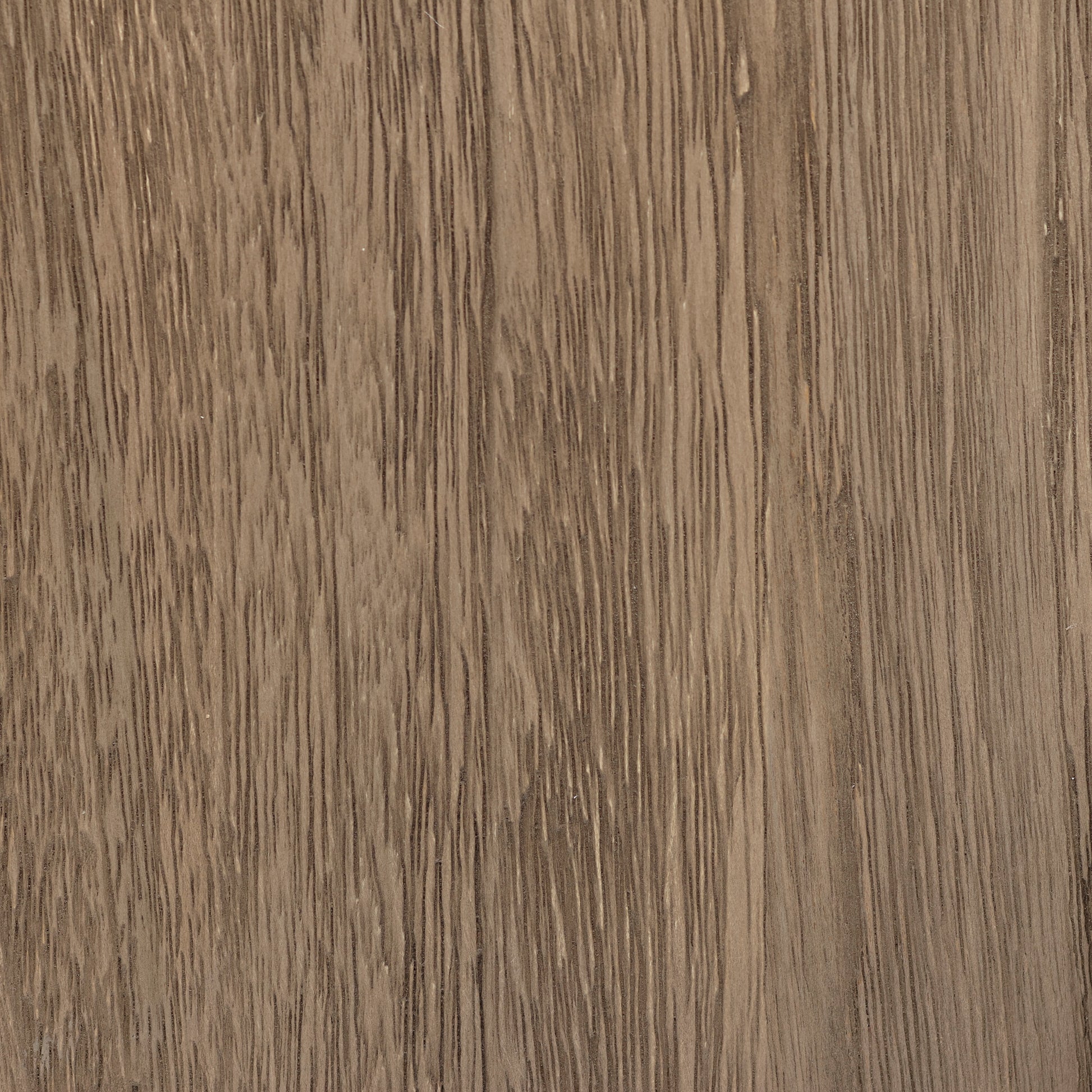 Teak wood grain surface with warm brown tones, dark vertical streaks, and a subtle gray wash in a plank-style finish.