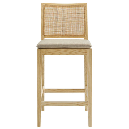 Natural wood counter stool with caned back, beige padded seat, square legs & stretcher.