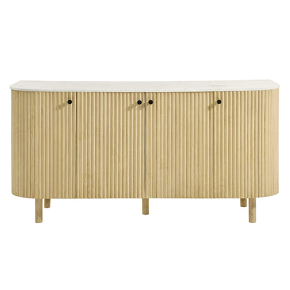 Natural wood fluted curved-front sideboard with white marble top and three doors on short legs.
