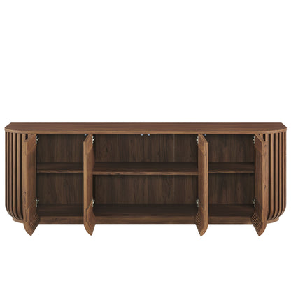 Walnut wood sideboard with rounded slat sides, four hinged doors, interior shelves, long rectangular top.