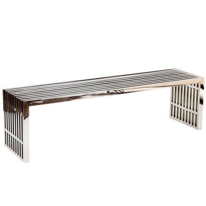 Polished stainless steel bench with horizontal slats and open rectangular end supports; modern minimalist seating.
