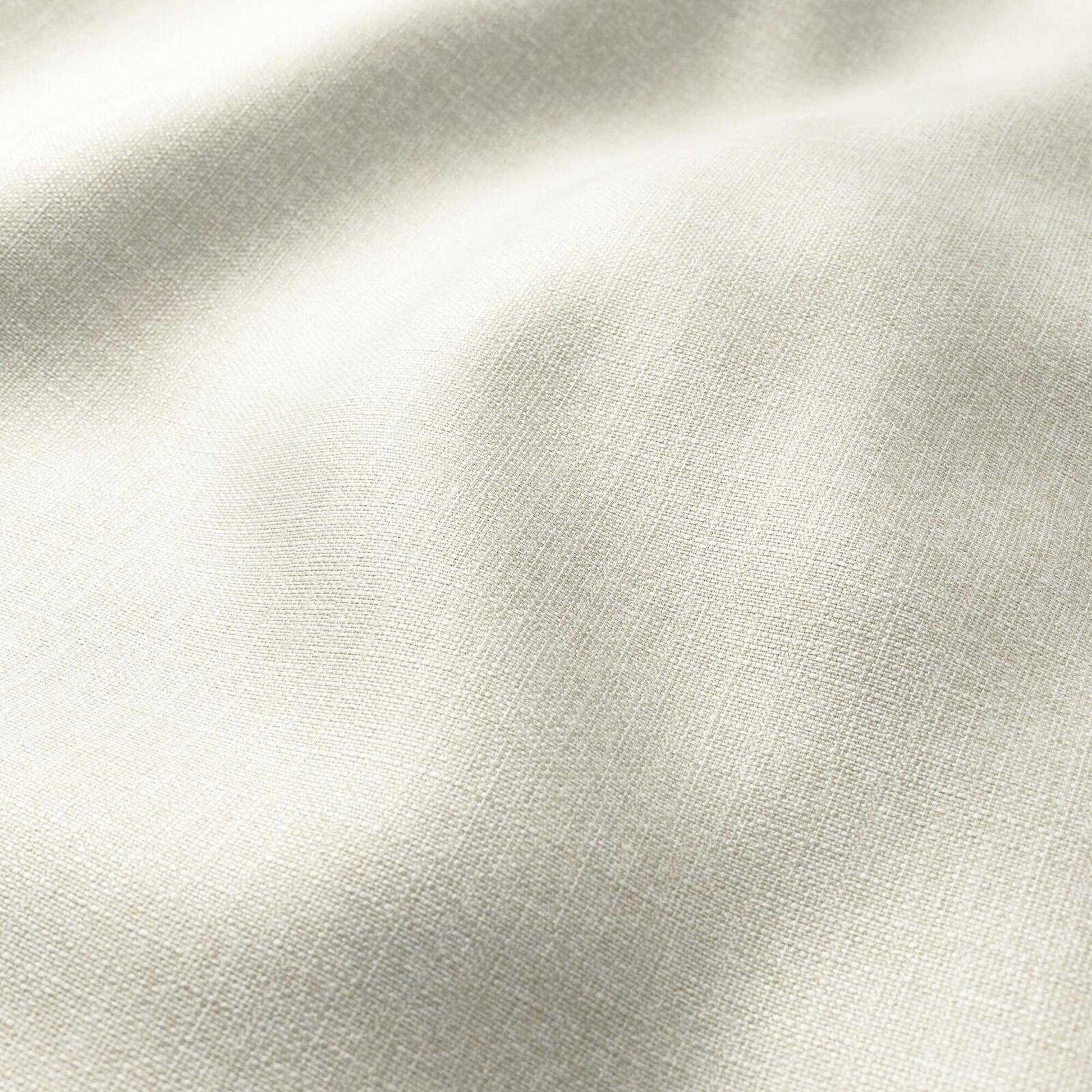 Cream linen-like fabric with a fine weave, soft drape and neutral cream/tan color, ideal for garments or home decor.